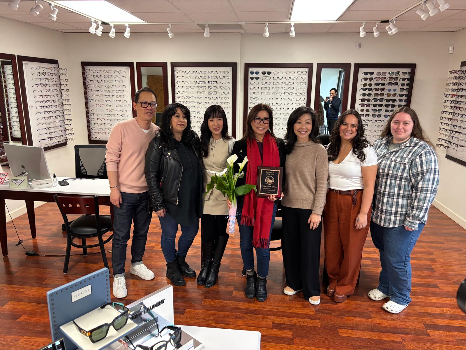 The Vallejo Optometry Group team celebrating Dr. Bach Kim Nguyen's ACCCOS Optometrist of the Year award